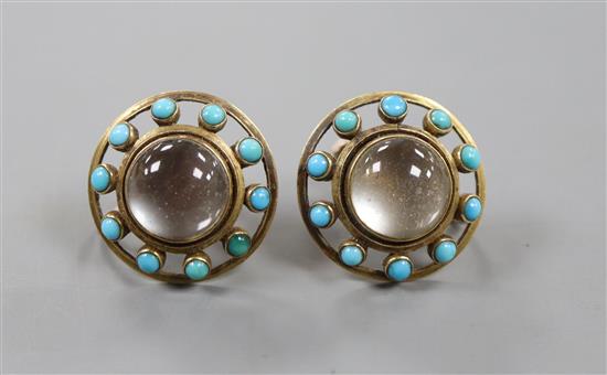 A pair of yellow metal, cabochon moonstone and turquoise set target ear clips, 18mm.